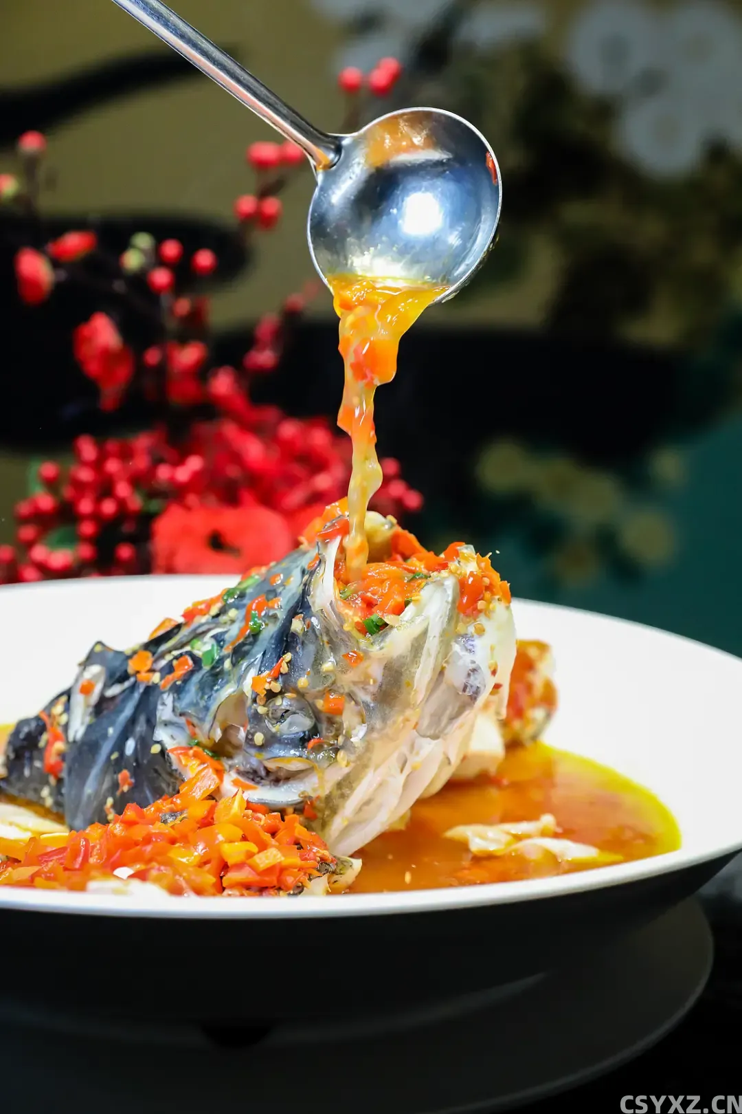 △湘潭经典名菜——剁椒鱼头（图/视觉中国）